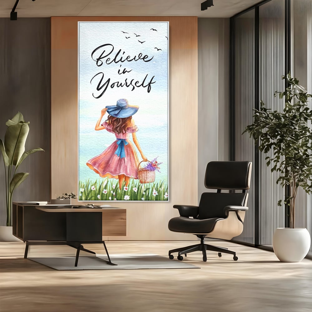 Tablou canvas cu ilustratie cu femeie si mesaj motivational, in rama de aluminiu argintiu, pe perete intr-un birou